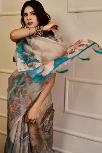 Grey shimmer printed zari saree with unstitched blouse piece.