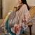 Grey shimmer printed zari saree with unstitched blouse piece.