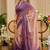 Purple shimmer printed zari saree with unstitched blouse piece.