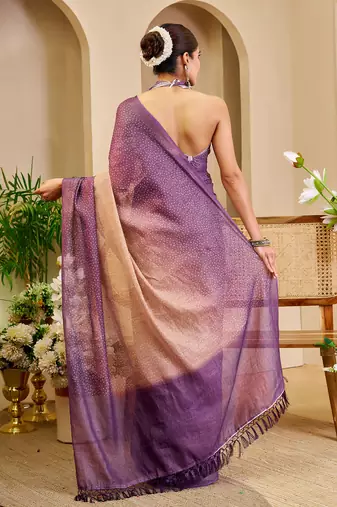 Purple shimmer printed zari saree with unstitched blouse piece.