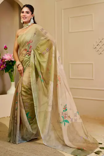 Green shimmer printed zari saree with unstitched blouse piece.