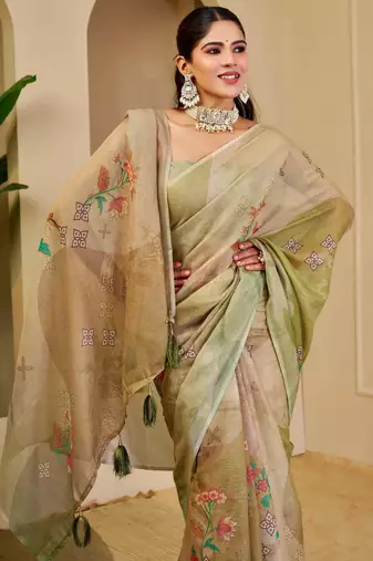 Green shimmer printed zari saree with unstitched blouse piece.