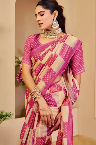 Pink shimmer printed zari saree with unstitched blouse piece.