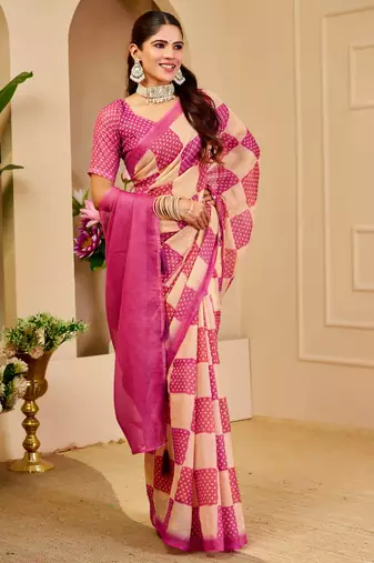 Pink shimmer printed zari saree with unstitched blouse piece.