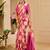 Pink shimmer printed zari saree with unstitched blouse piece.