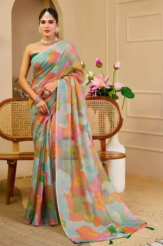 Sea green shimmer printed zari saree with unstitched blouse piece.