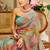 Sea green shimmer printed zari saree with unstitched blouse piece.