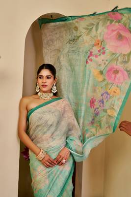 Turquoise shimmer printed zari saree with unstitched blouse piece. 2