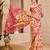 Pink shimmer printed zari saree with unstitched blouse piece.