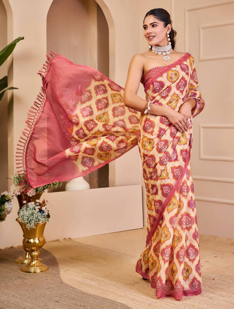 Pink shimmer printed zari saree with unstitched blouse piece.