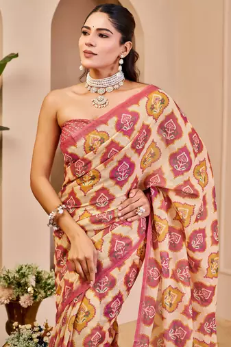 Pink shimmer printed zari saree with unstitched blouse piece.