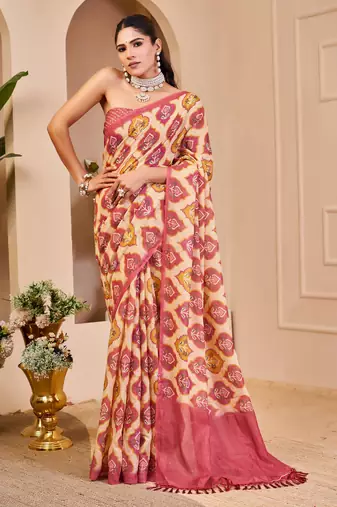 Pink shimmer printed zari saree with unstitched blouse piece.