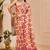 Pink shimmer printed zari saree with unstitched blouse piece.