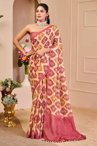 Pink shimmer printed zari saree with unstitched blouse piece.