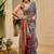 Navy blue shimmer printed zari saree with unstitched blouse piece.