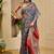 Navy blue shimmer printed zari saree with unstitched blouse piece.