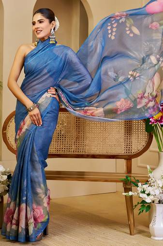Blue shimmer printed zari saree with unstitched blouse piece.