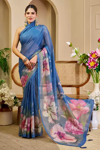Blue shimmer printed zari saree with unstitched blouse piece.
