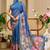 Blue shimmer printed zari saree with unstitched blouse piece.