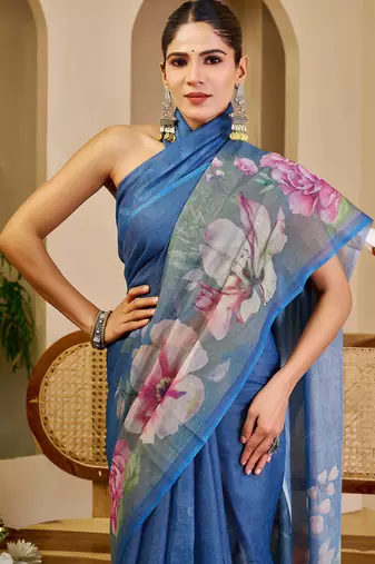 Blue shimmer printed zari saree with unstitched blouse piece.