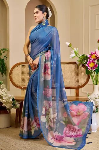 Blue shimmer printed zari saree with unstitched blouse piece.