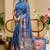 Blue shimmer printed zari saree with unstitched blouse piece.