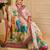 Beige shimmer printed zari saree with unstitched blouse piece.