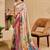 Beige shimmer printed zari saree with unstitched blouse piece.