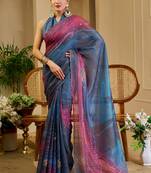 Blue shimmer printed zari saree with unstitched blouse piece.