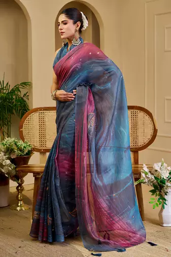Blue shimmer printed zari saree with unstitched blouse piece.