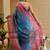 Blue shimmer printed zari saree with unstitched blouse piece.