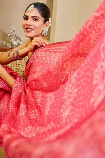 Gajari shimmer printed zari saree with unstitched blouse piece.