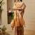 Beige shimmer printed zari saree with unstitched blouse piece.