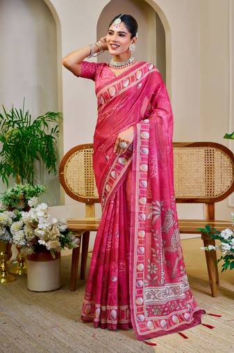 Pink shimmer printed zari saree with unstitched blouse piece.