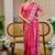 Pink shimmer printed zari saree with unstitched blouse piece.