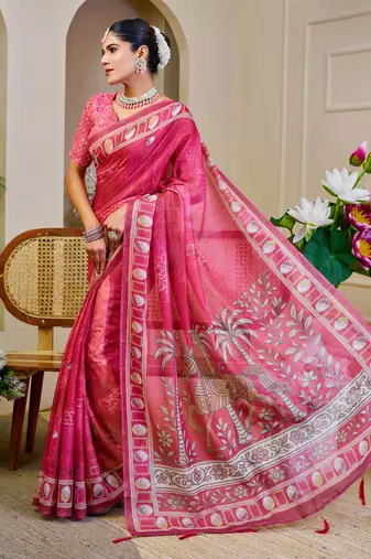 Pink shimmer printed zari saree with unstitched blouse piece.