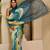 Teal shimmer printed zari saree with unstitched blouse piece.