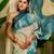Teal shimmer printed zari saree with unstitched blouse piece.