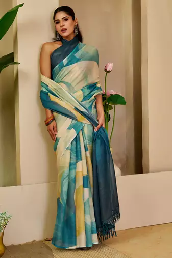 Teal shimmer printed zari saree with unstitched blouse piece.