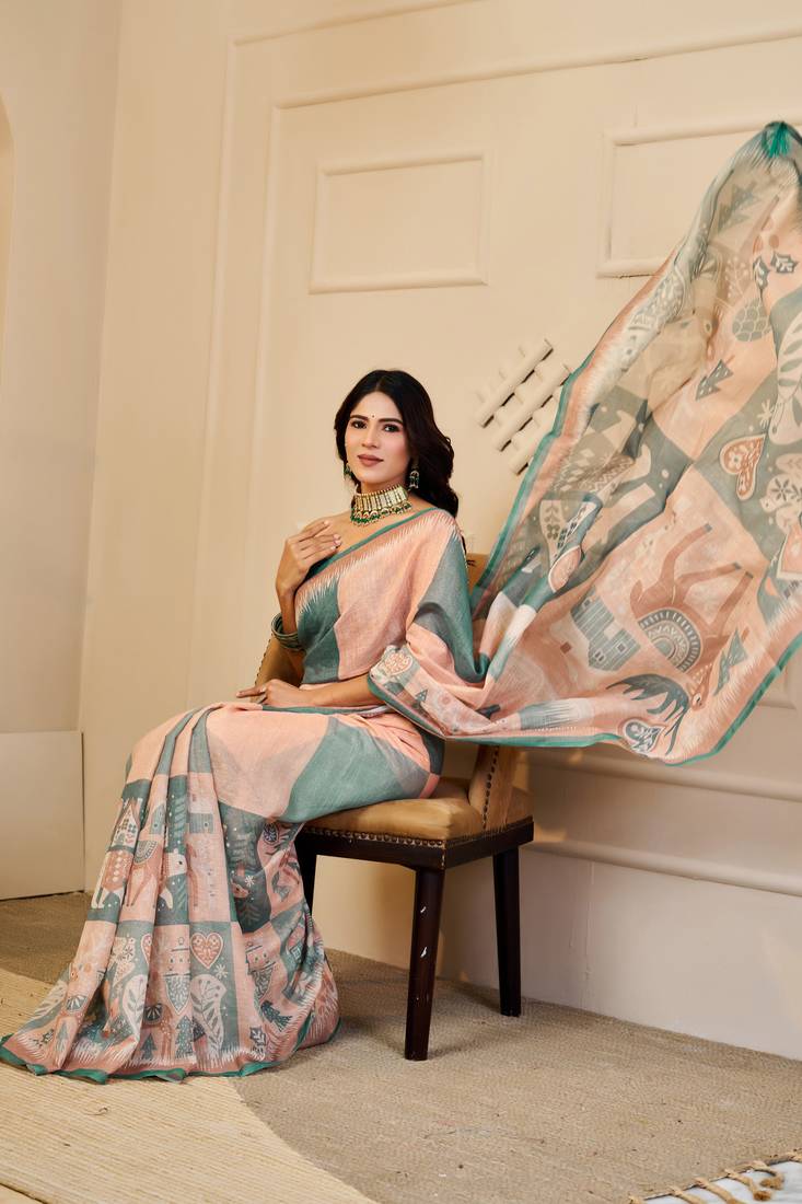 Peach & sea green shimmer printed zari saree with unstitched blouse piece.