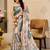 Peach & sea green shimmer printed zari saree with unstitched blouse piece.