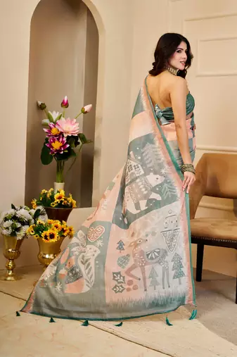 Peach & sea green shimmer printed zari saree with unstitched blouse piece.