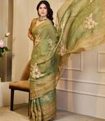 Olive shimmer printed zari saree with unstitched blouse piece.