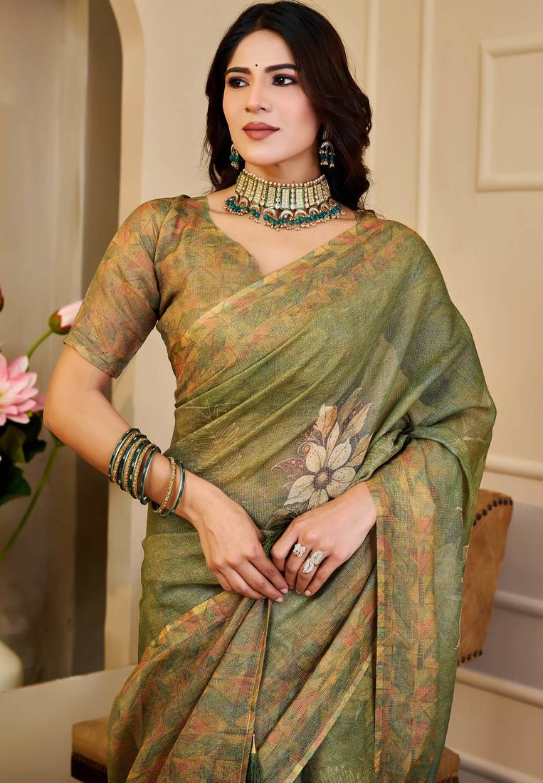 Olive shimmer printed zari saree with unstitched blouse piece.