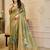 Olive shimmer printed zari saree with unstitched blouse piece.