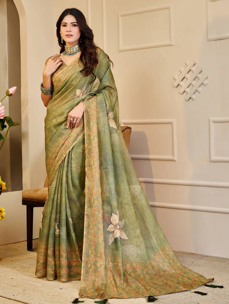 Olive shimmer printed zari saree with unstitched blouse piece.