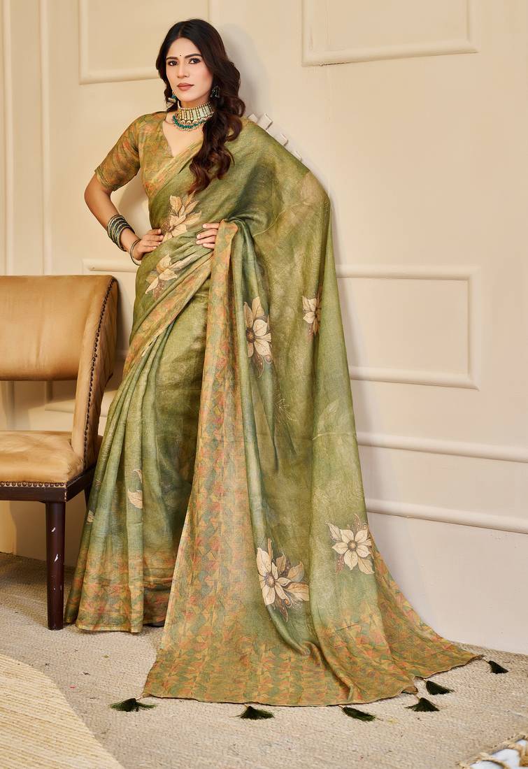 Olive shimmer printed zari saree with unstitched blouse piece.