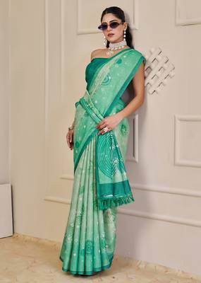 Turquoise shimmer printed zari saree with unstitched blouse piece. 2