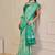 Turquoise shimmer printed zari saree with unstitched blouse piece.
