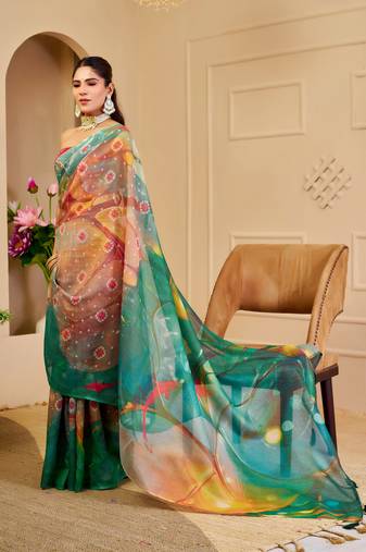 Multi color shimmer printed zari saree with unstitched blouse piece.